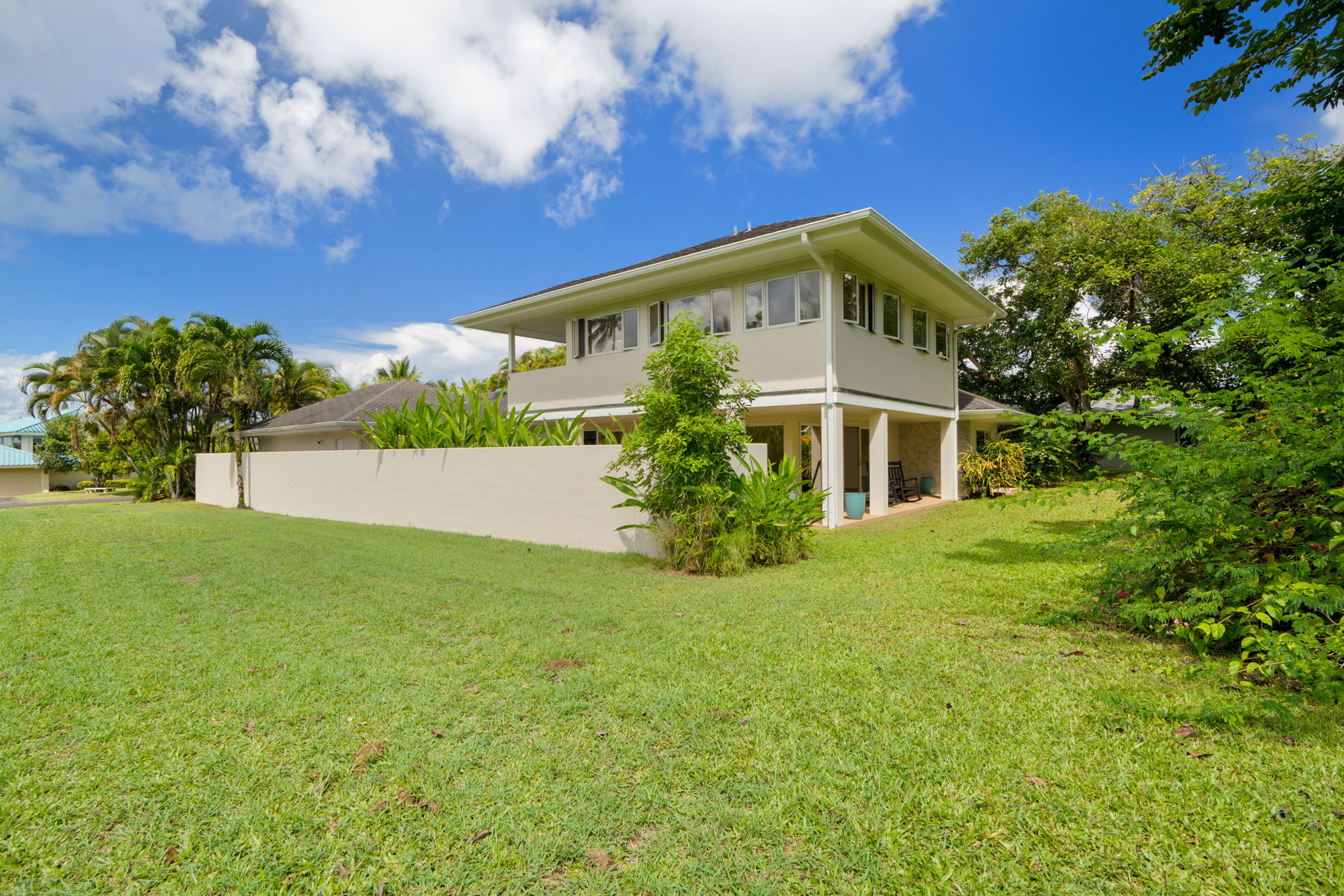 4179 Liholiho Road Princeville, HI 96722 - Photo 8 of 30 a view of a house with a yard