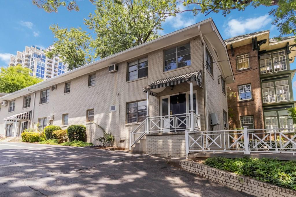 816 Piedmont Avenue Northeast, Unit 1 Atlanta, GA 30308 - Photo 1 of 21 a front view of a house with garden