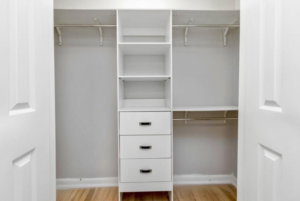 816 Piedmont Avenue Northeast, Unit 1 Atlanta, GA 30308 - Photo 13 of 21 a view of walk in closet with empty racks