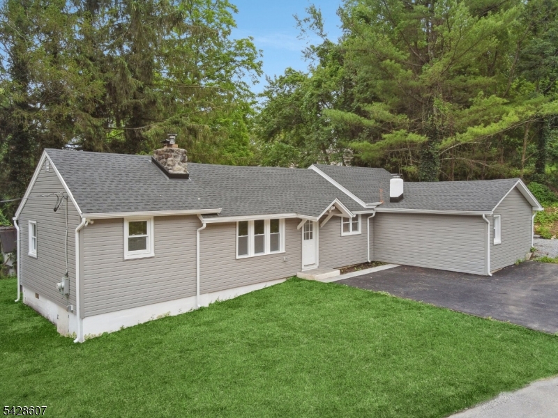 223 Waconia Road Vernon, NJ 07422 - Photo 1 of 26 front view of house with a yard
