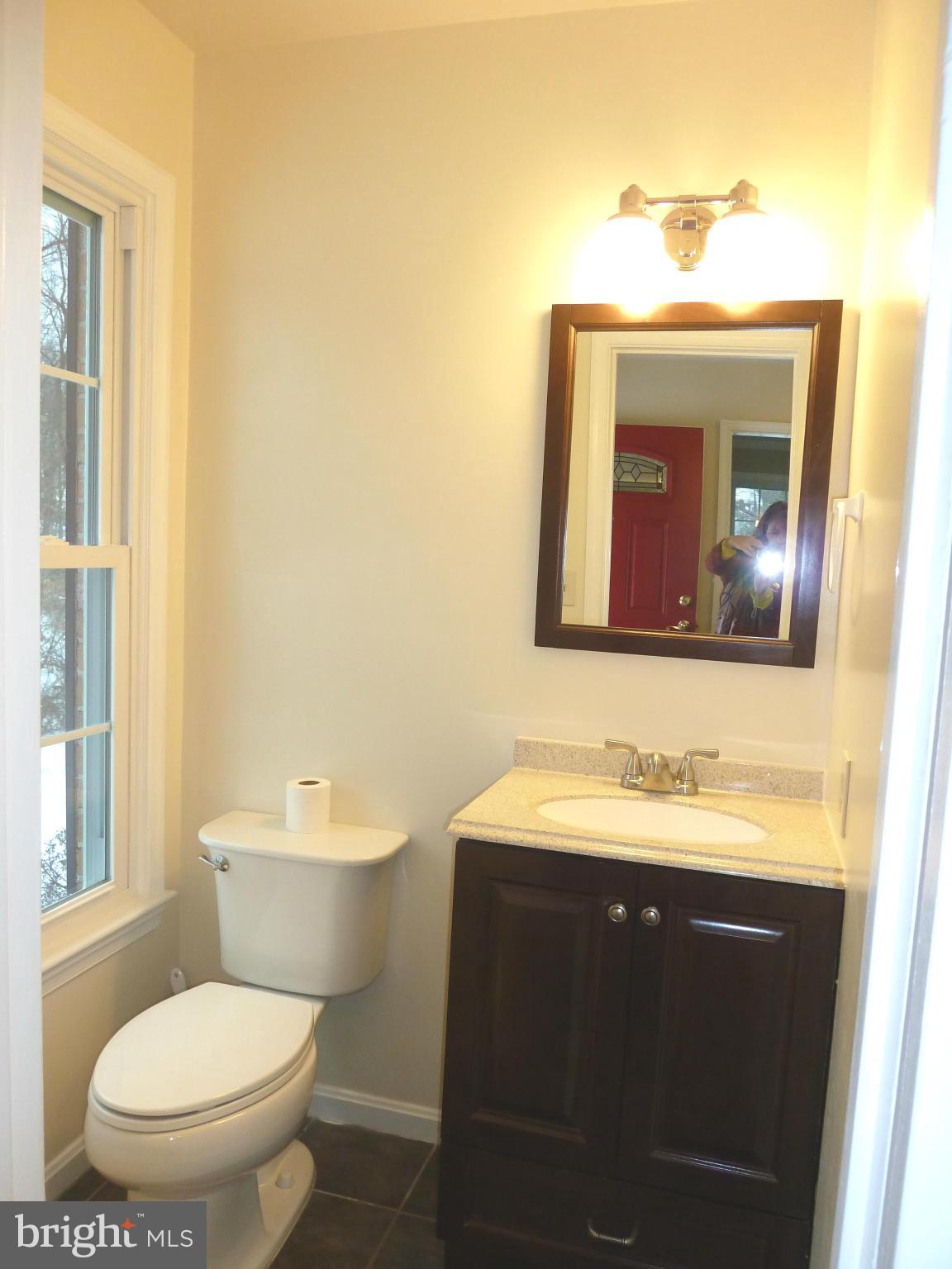 1016 Windrush Lane, Unit 25 Sandy Spring, MD 20860 - Photo 8 of 30 Powder Rm: New Toilet & Vanity