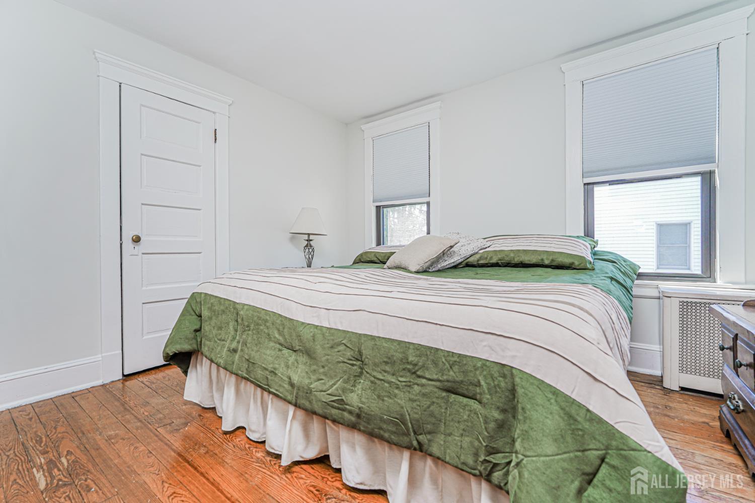 12 Fox Road Edison, NJ 08817 - Photo 15 of 21 a bedroom with a bed and a window