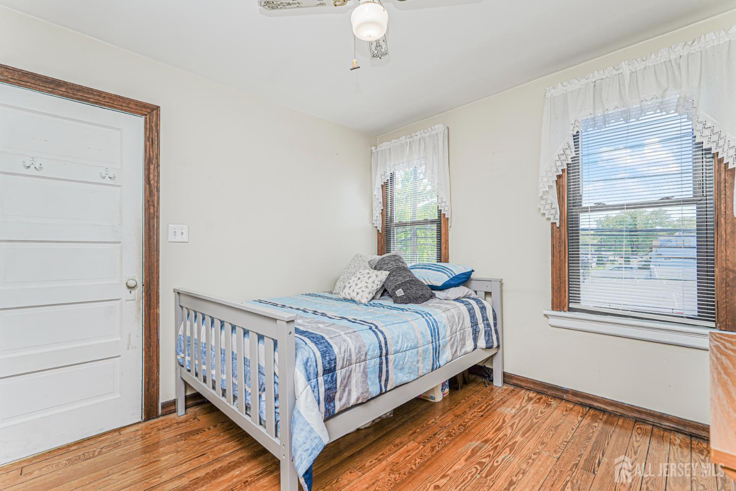 12 Fox Road Edison, NJ 08817 - Photo 16 of 21 a bedroom with a bed and a window