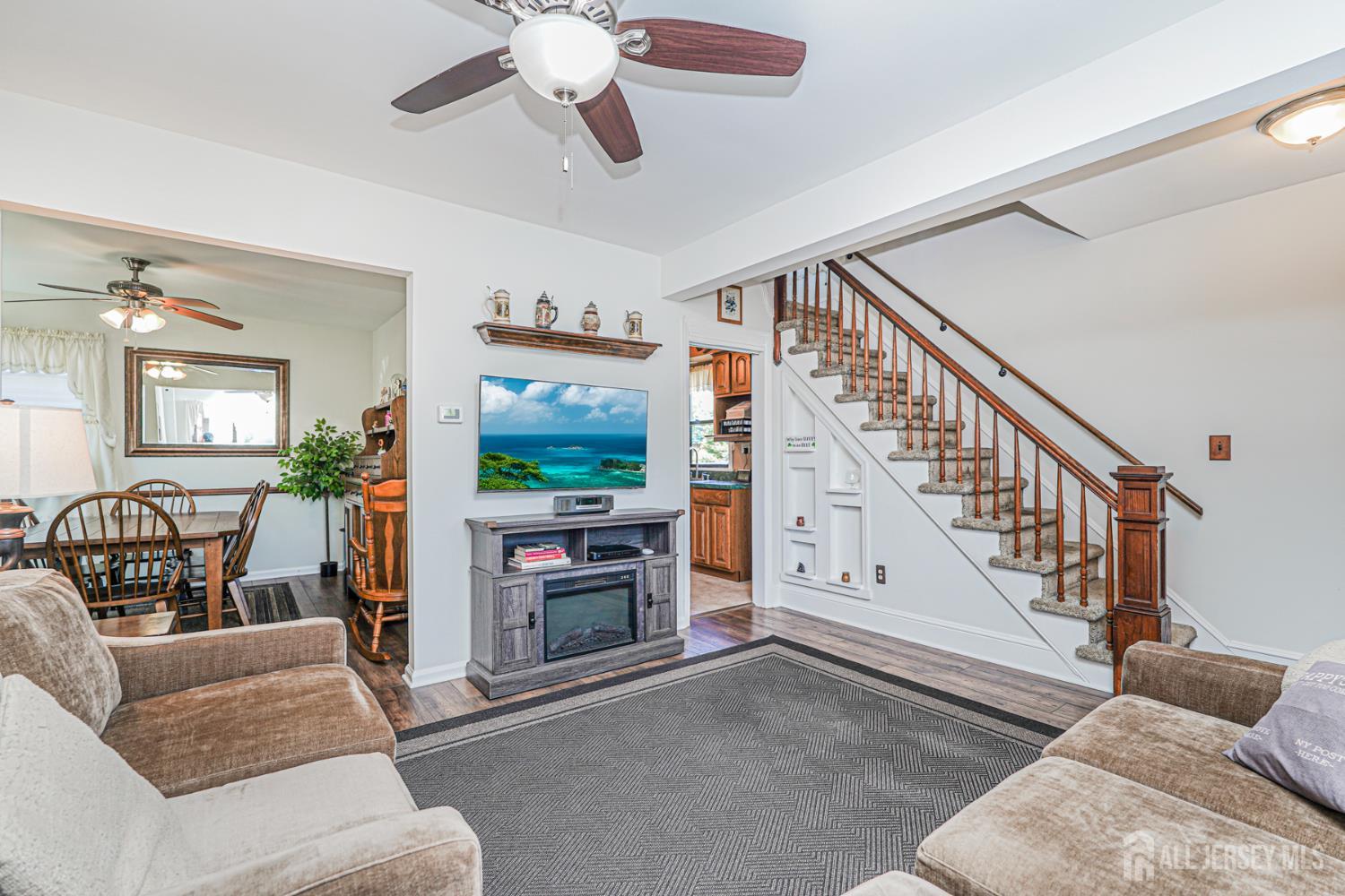 12 Fox Road Edison, NJ 08817 - Photo 7 of 21 a view of livingroom with furniture wooden floor and windows