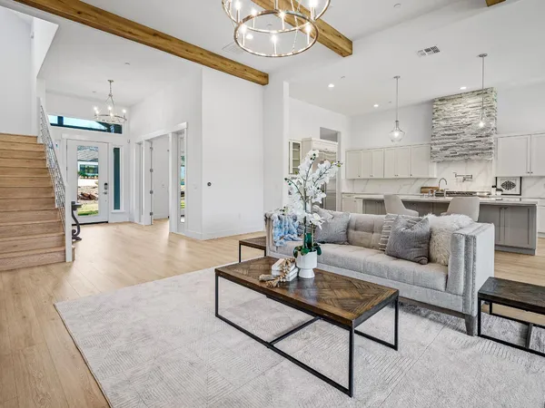 a spacious bedroom with a bed a large window with outer view and balcony view