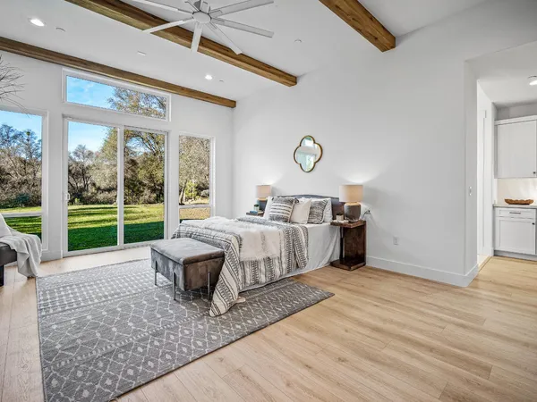 a bathroom with a double vanity sink and mirror