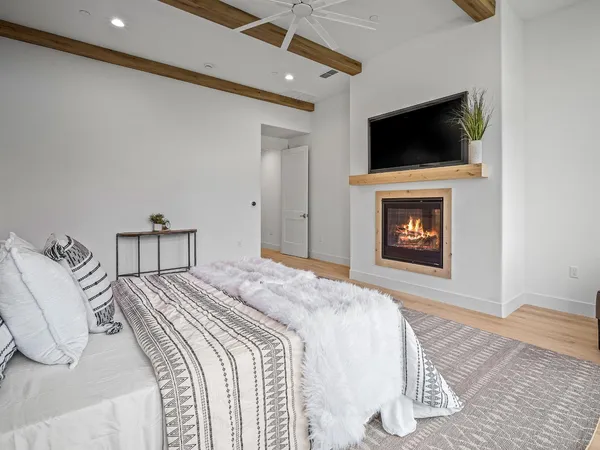 a bathroom with a double vanity sink and shower