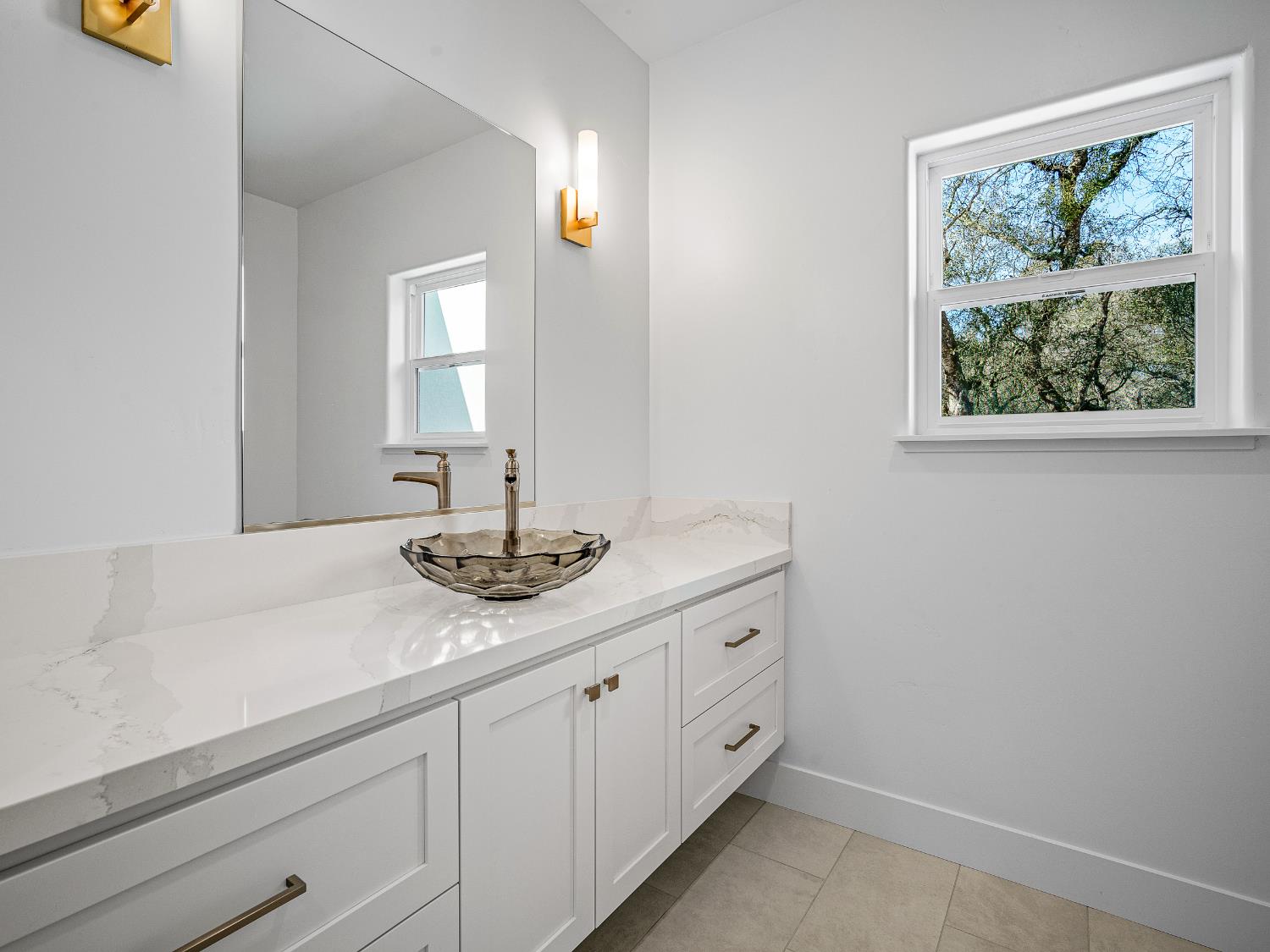 8118 Bridger Lane Shingle Springs, CA 95682 - Photo 21 of 59 a bathroom with a sink and a mirror