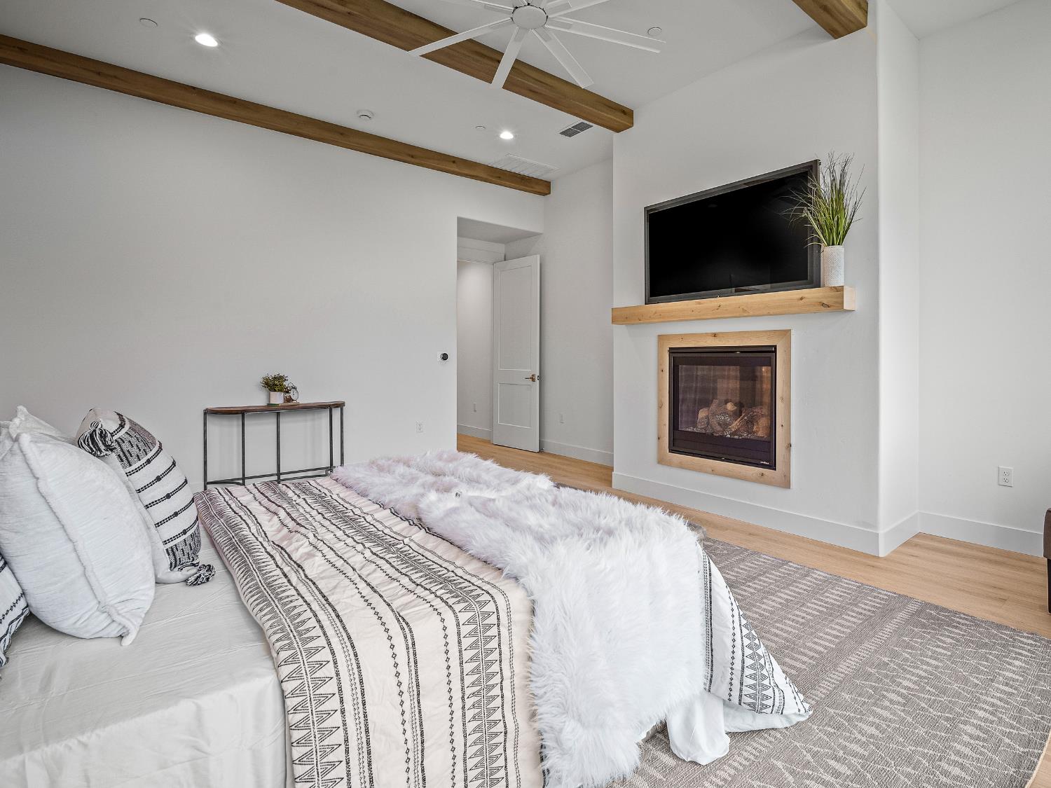 8118 Bridger Lane Shingle Springs, CA 95682 - Photo 24 of 59 a bedroom with a bed and a television