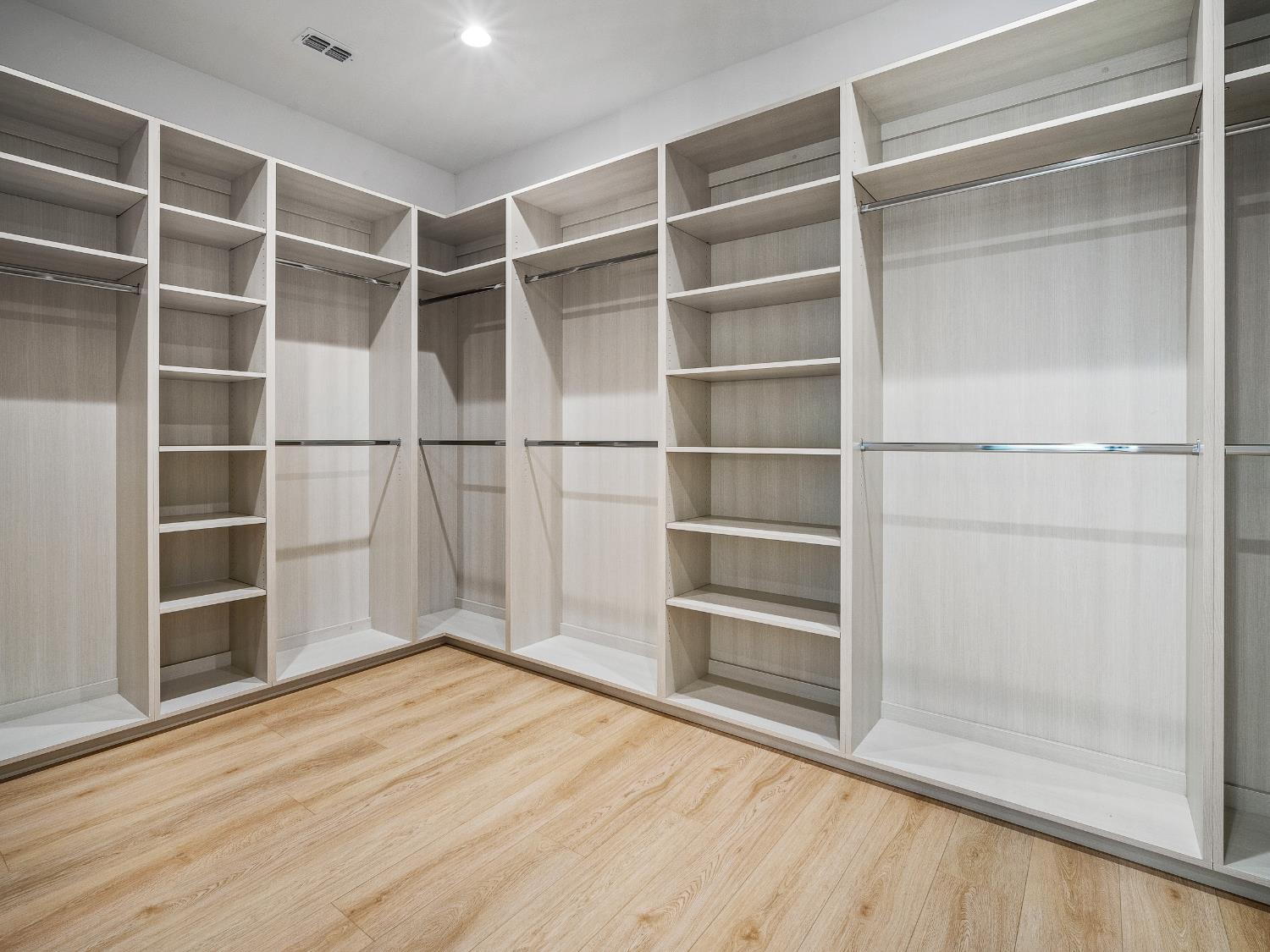8118 Bridger Lane Shingle Springs, CA 95682 - Photo 26 of 59 a view of an empty room with wooden floor and a window