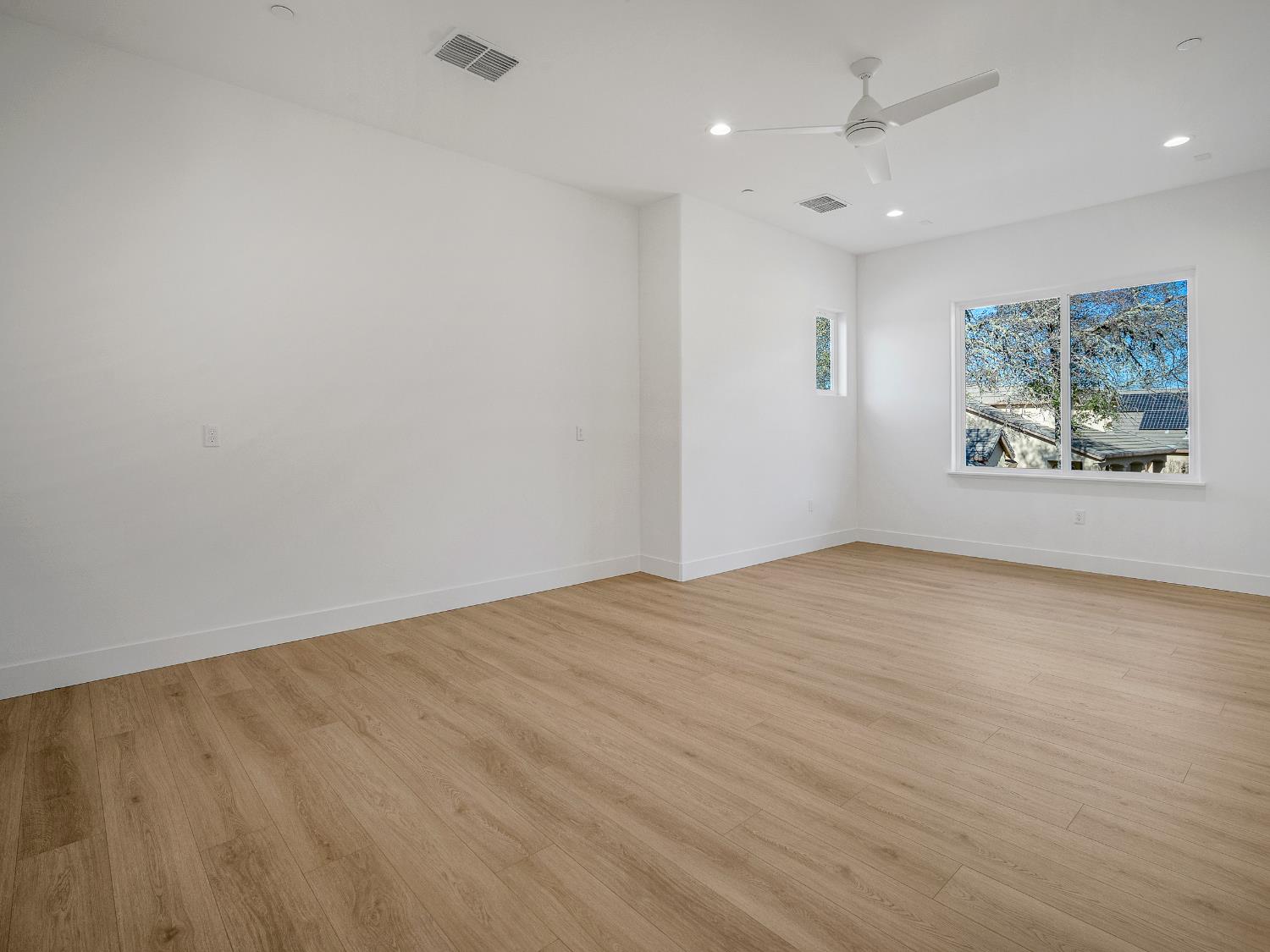 8118 Bridger Lane Shingle Springs, CA 95682 - Photo 33 of 59 an empty room with windows and closet