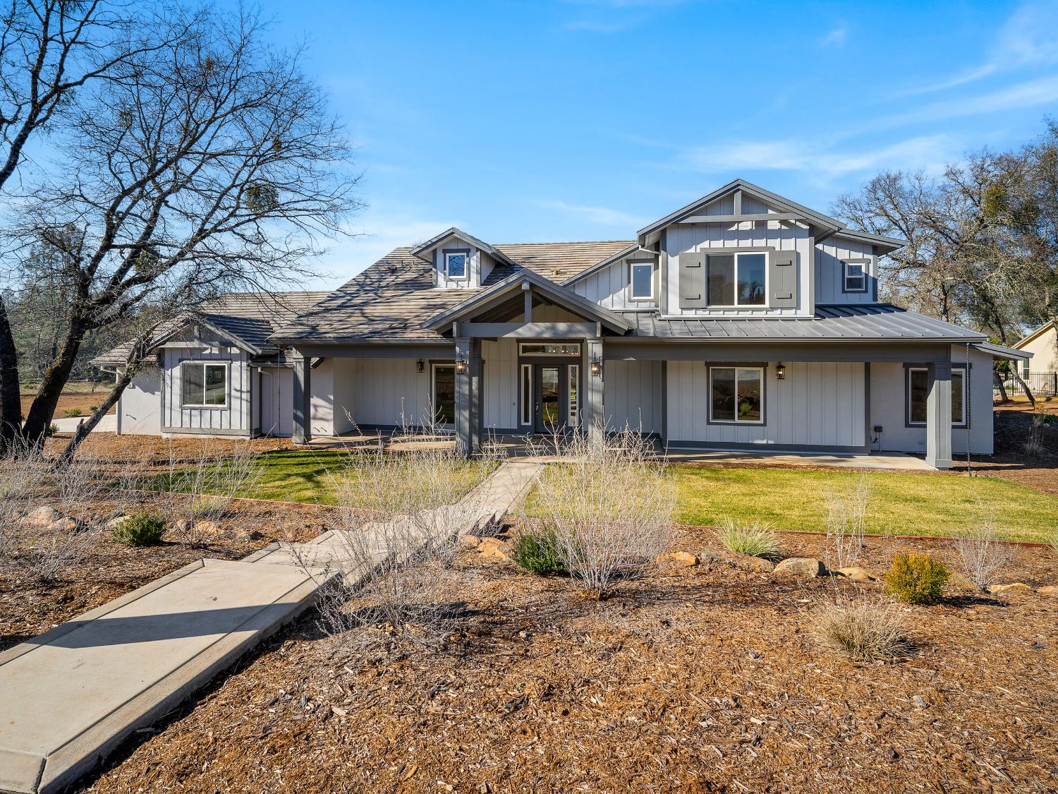 8118 Bridger Lane Shingle Springs, CA 95682 - Photo 44 of 59 a front view of a house with swimming pool