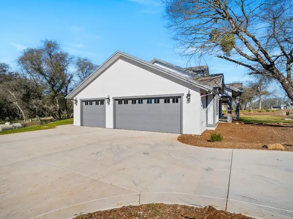 a front view of a house with swimming pool