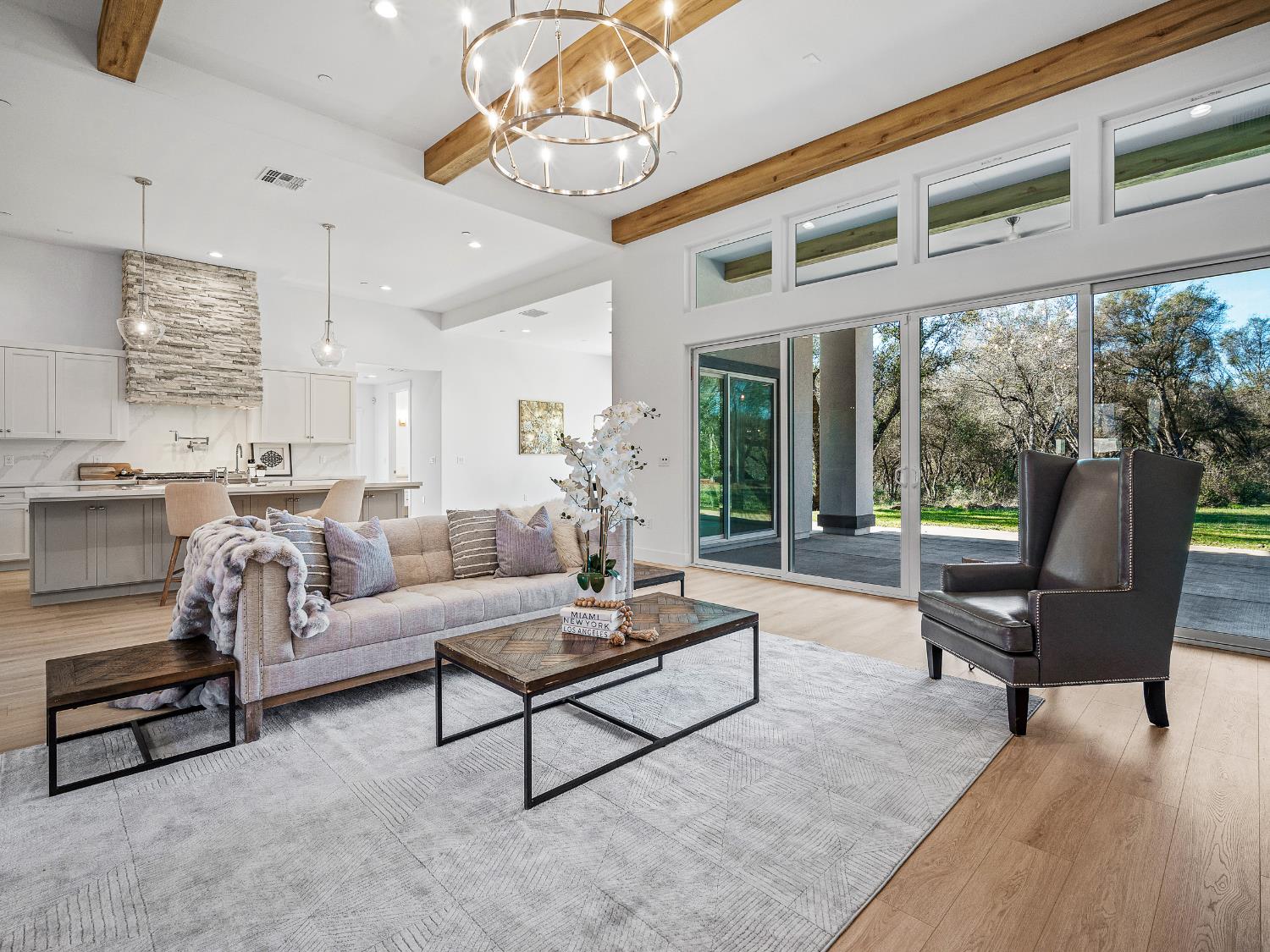 8118 Bridger Lane Shingle Springs, CA 95682 - Photo 9 of 59 a living room with furniture and a large window