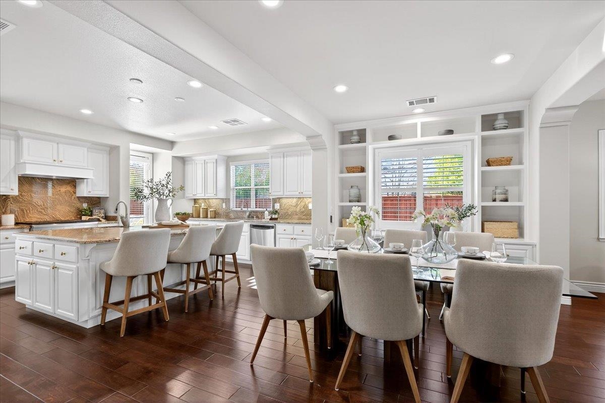 7035 Emerson Lane San Ramon, CA 94582 - Photo 13 of 60 a view of a dining room with furniture window and wooden floor