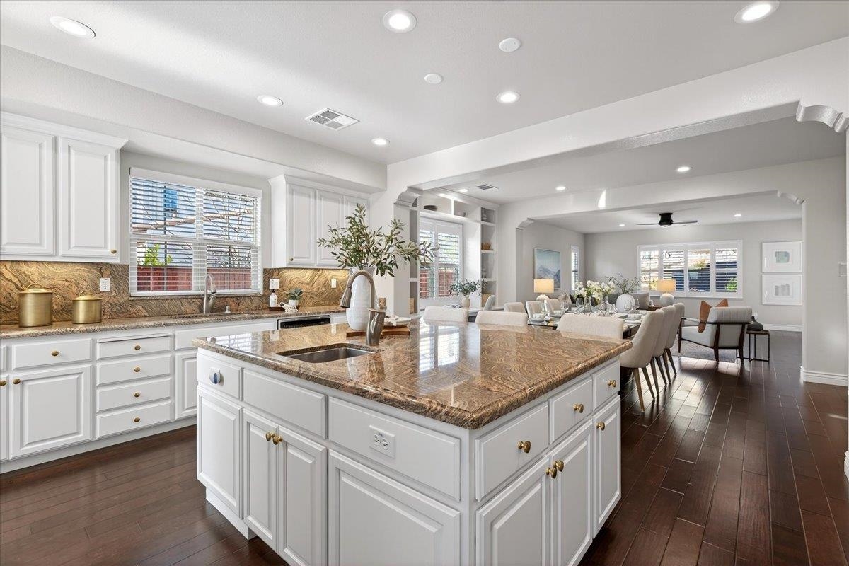 7035 Emerson Lane San Ramon, CA 94582 - Photo 19 of 60 a kitchen with sink stove and center island