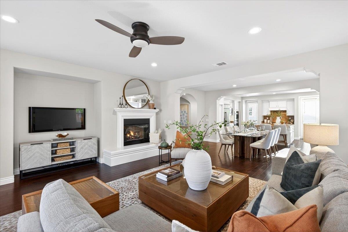 7035 Emerson Lane San Ramon, CA 94582 - Photo 23 of 60 a living room with furniture kitchen view and a fireplace