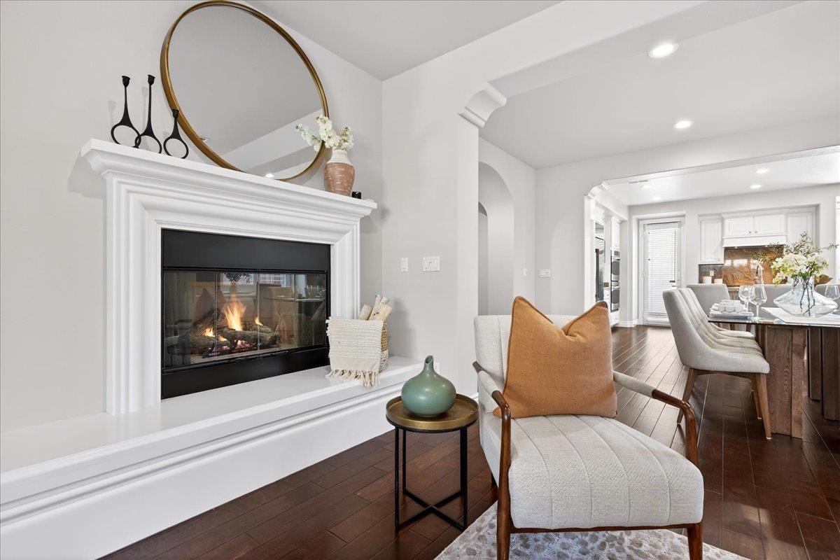 7035 Emerson Lane San Ramon, CA 94582 - Photo 24 of 60 a living room with furniture a flat screen tv and a fireplace