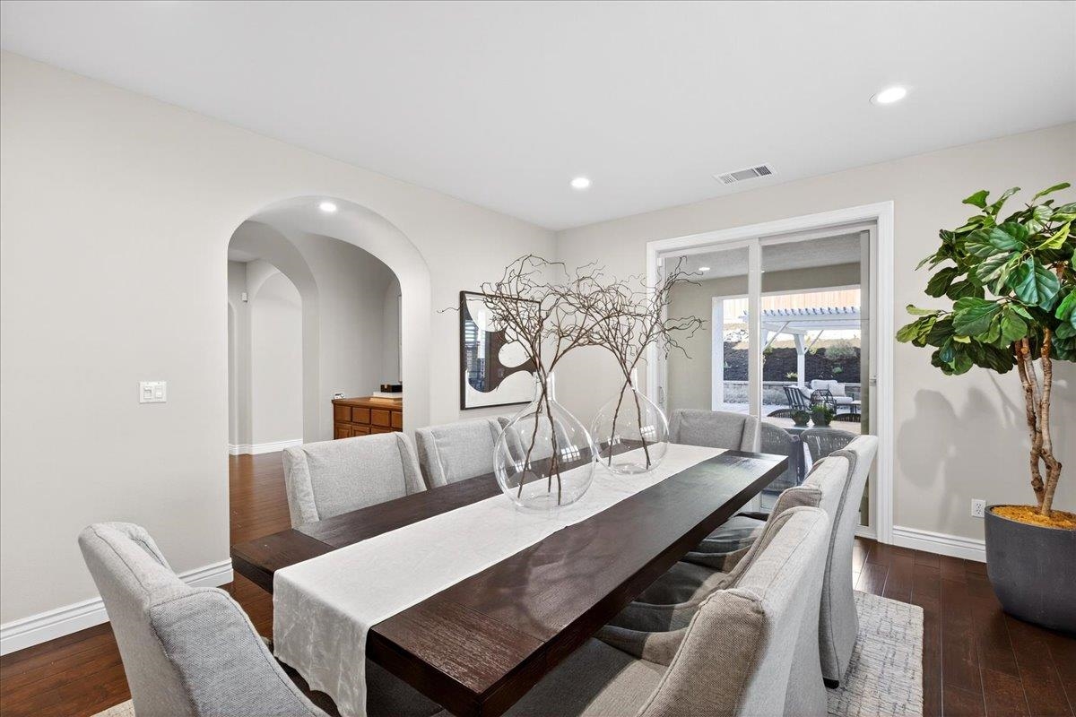 7035 Emerson Lane San Ramon, CA 94582 - Photo 28 of 60 a view of a dining room with furniture and a potted plant