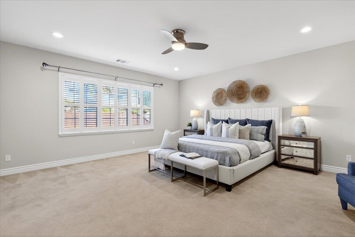7035 Emerson Lane San Ramon, CA 94582 - Photo 33 of 60 a spacious bedroom with a bed and a large window