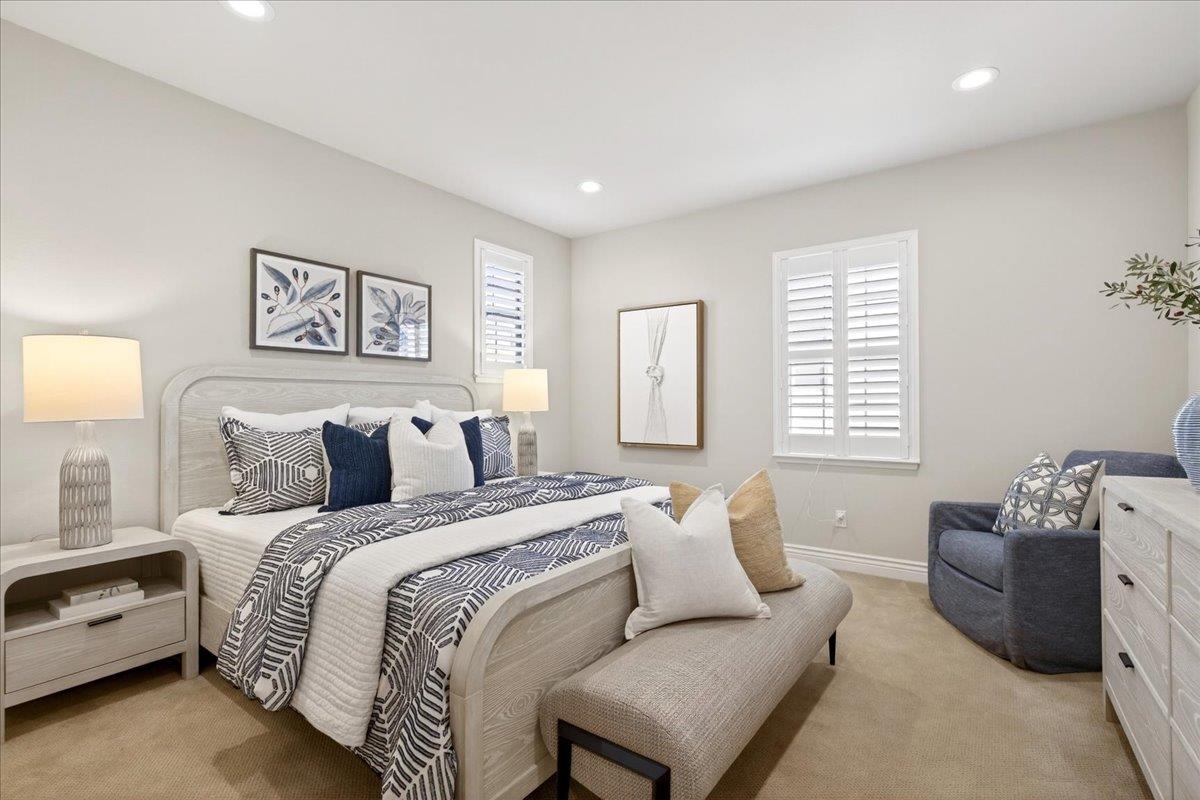 7035 Emerson Lane San Ramon, CA 94582 - Photo 39 of 60 a spacious bedroom with a bed and a couch