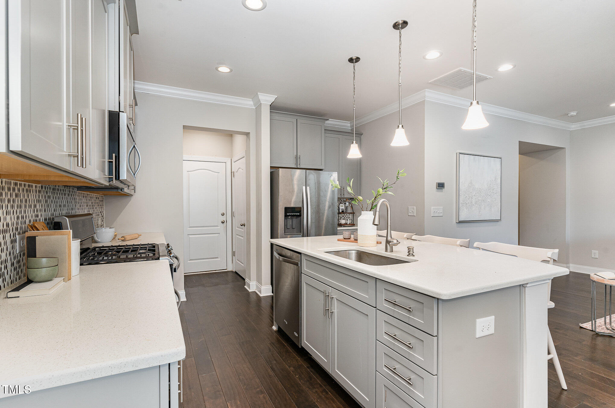 1314 Catch Fly Lane Durham, NC 27713 - Photo 9 of 31 a kitchen with a sink a counter space appliances and cabinets