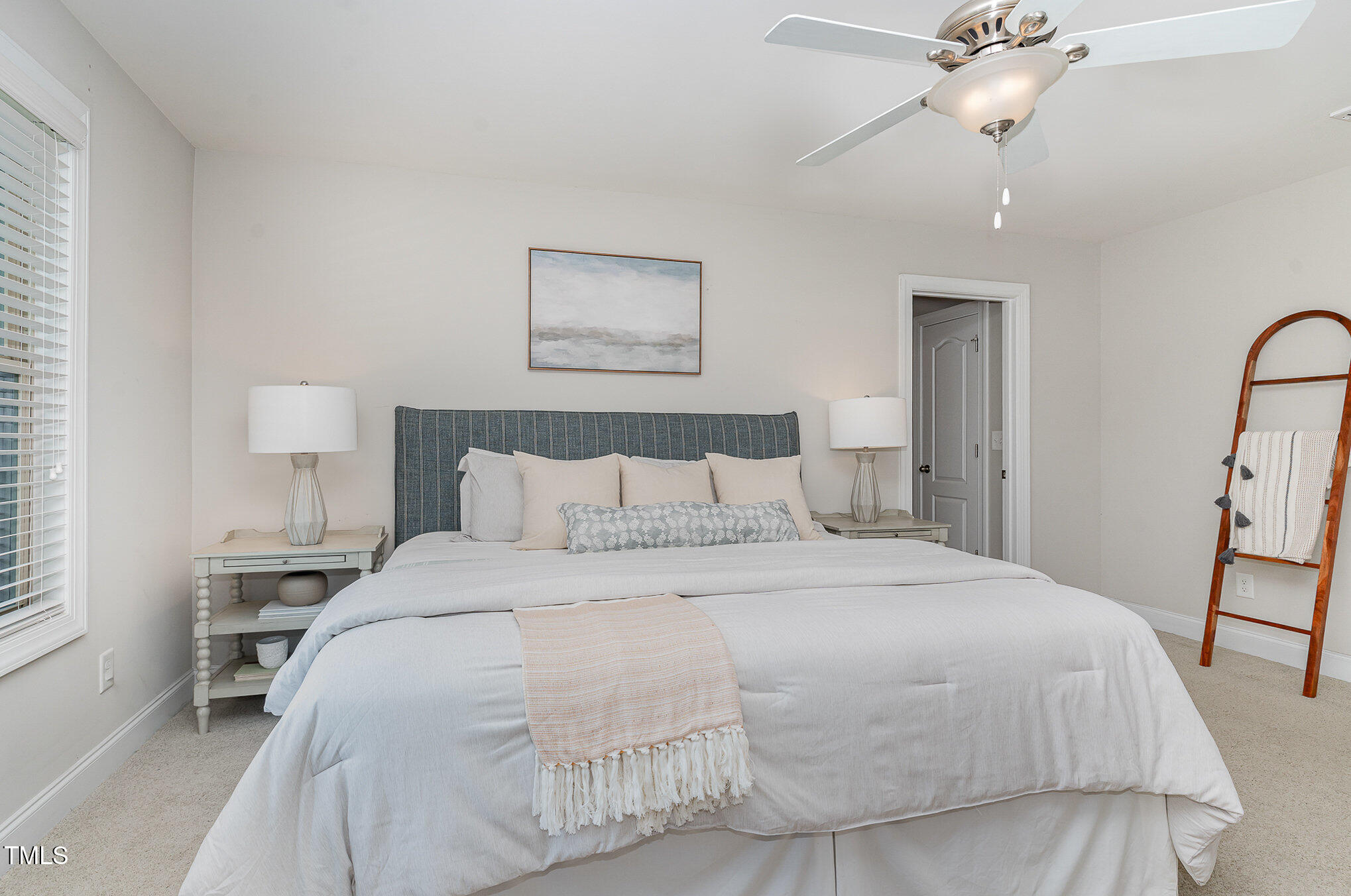 1314 Catch Fly Lane Durham, NC 27713 - Photo 14 of 31 a bedroom with a bed and a chandelier