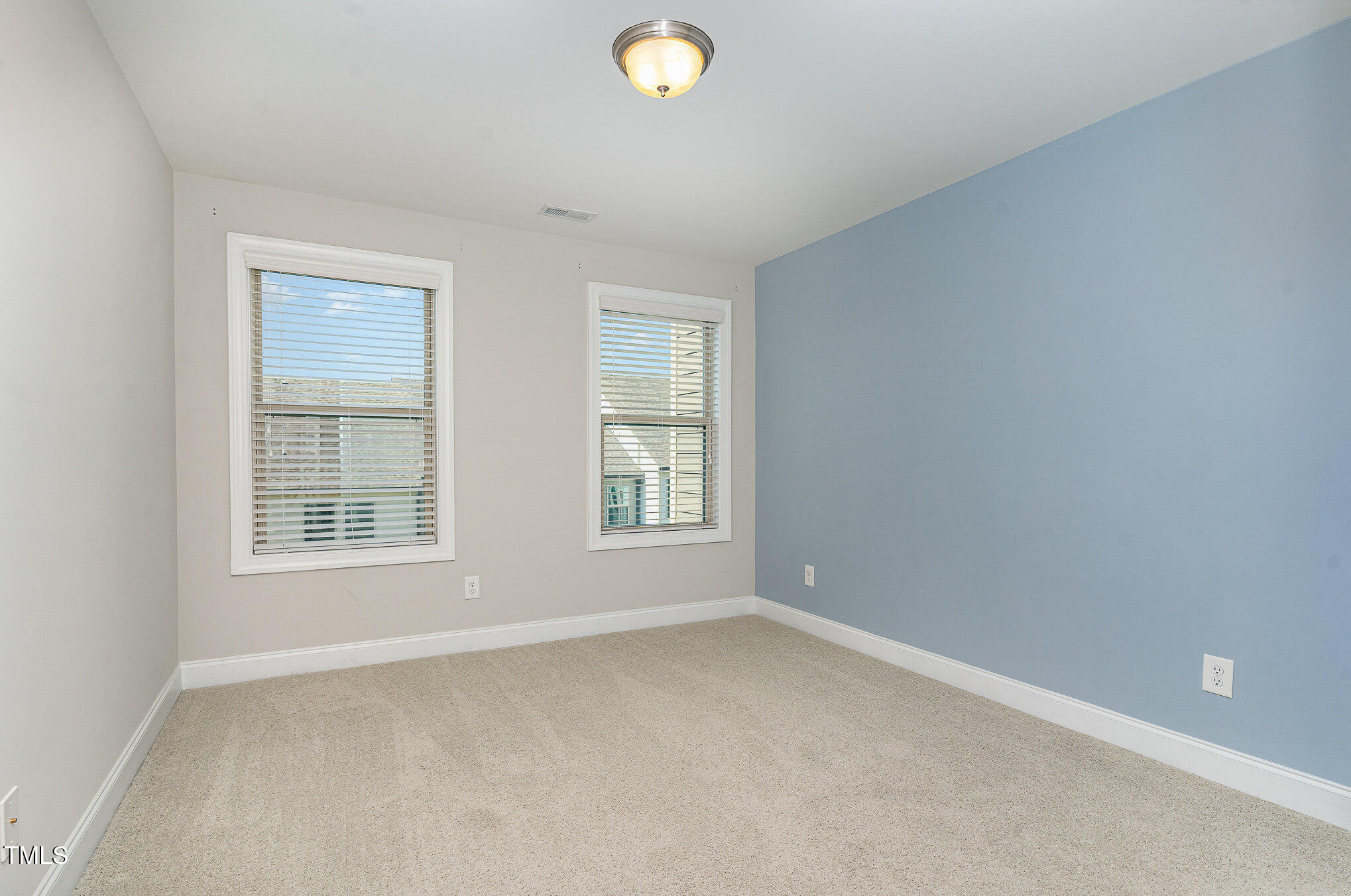 1314 Catch Fly Lane Durham, NC 27713 - Photo 18 of 31 an empty room with a window