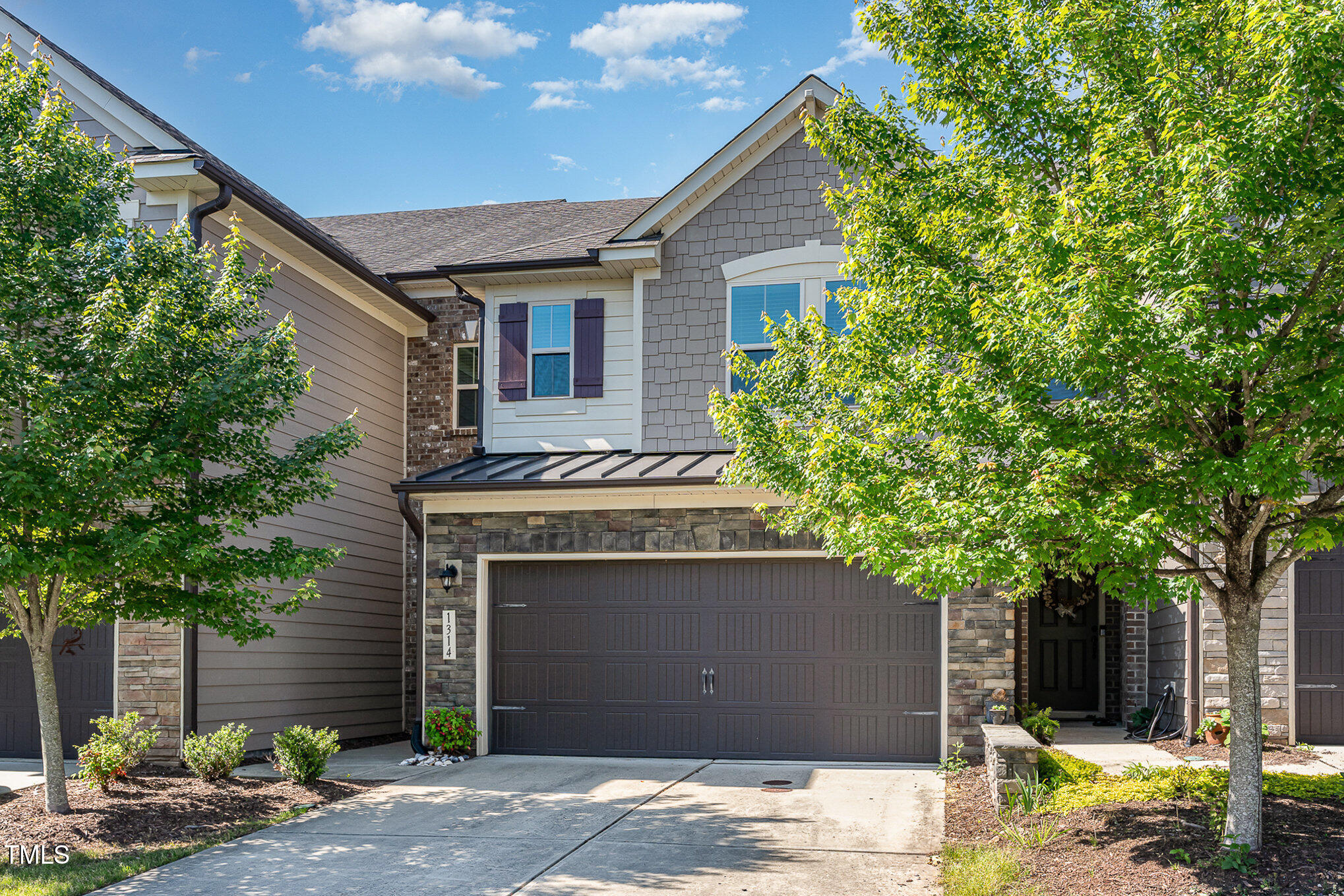 1314 Catch Fly Lane Durham, NC 27713 - Photo 29 of 31 a front view of a house with garden