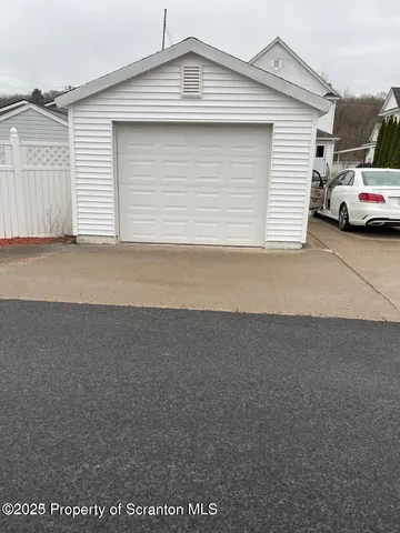 a car parked in front of a house