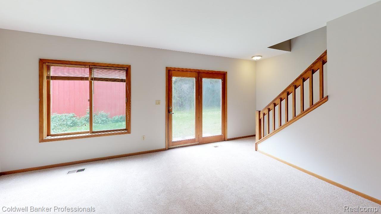8611 Tindall Road Davisburg, MI 48350 - Photo 8 of 23 Entry Door Wall and Stairway to the 2nd Floor