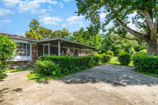 a view of front of house with a yard