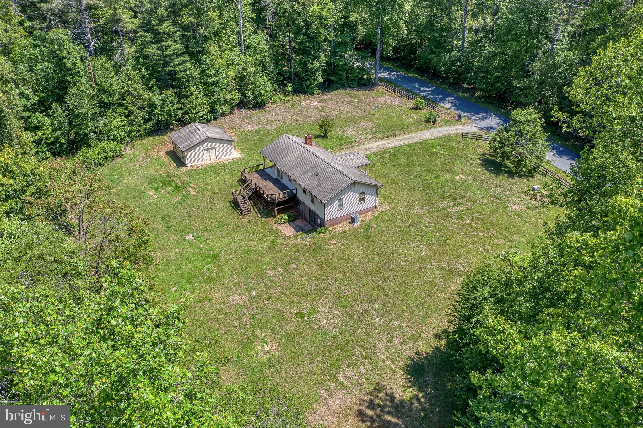 803 Weaver Hollow Road Banco, VA 22711 - Photo 45 of 67 an aerial view of a house with a yard
