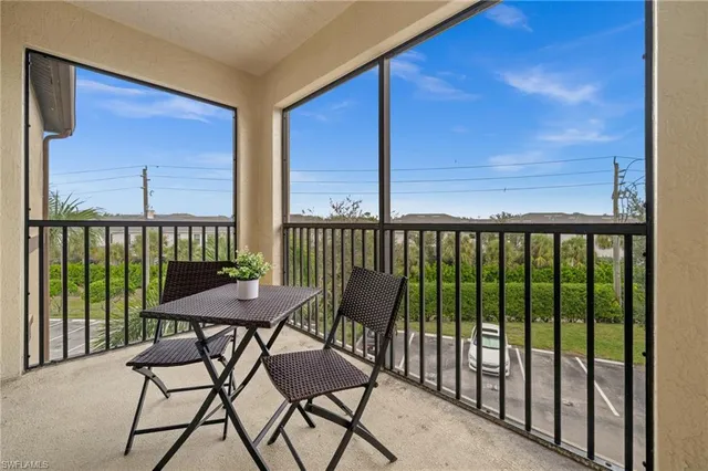 a view of a chairs on the roof deck