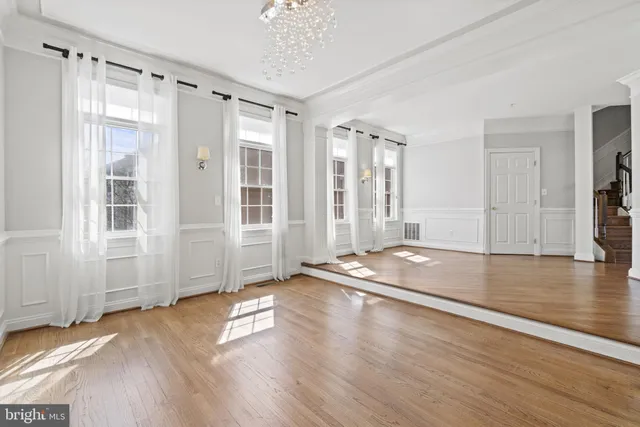 a view of a livingroom with wooden floor