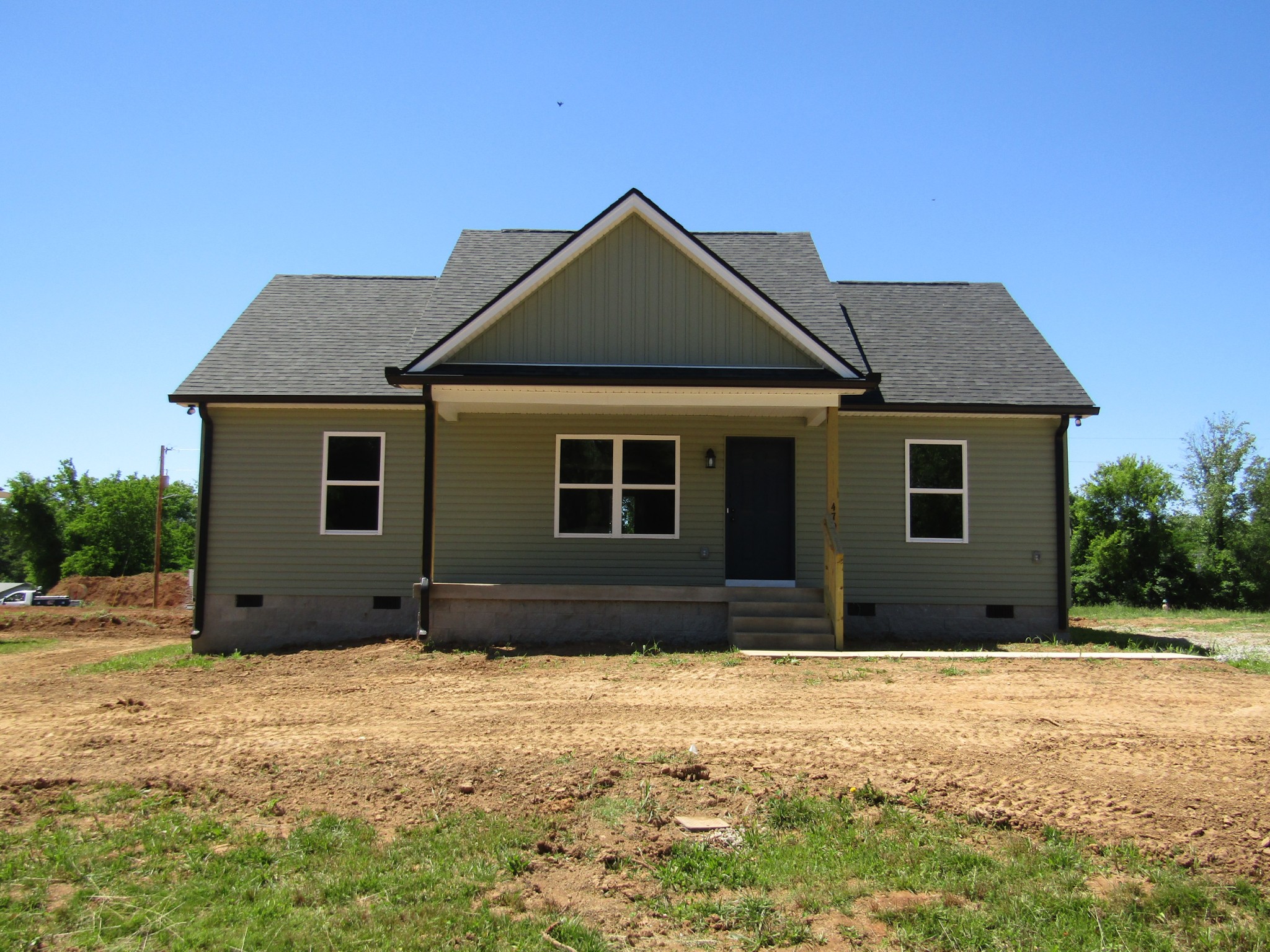 470 Crescent Factory Road Lawrenceburg, TN 38464 - Photo 1 of 15 a house with trees in the background