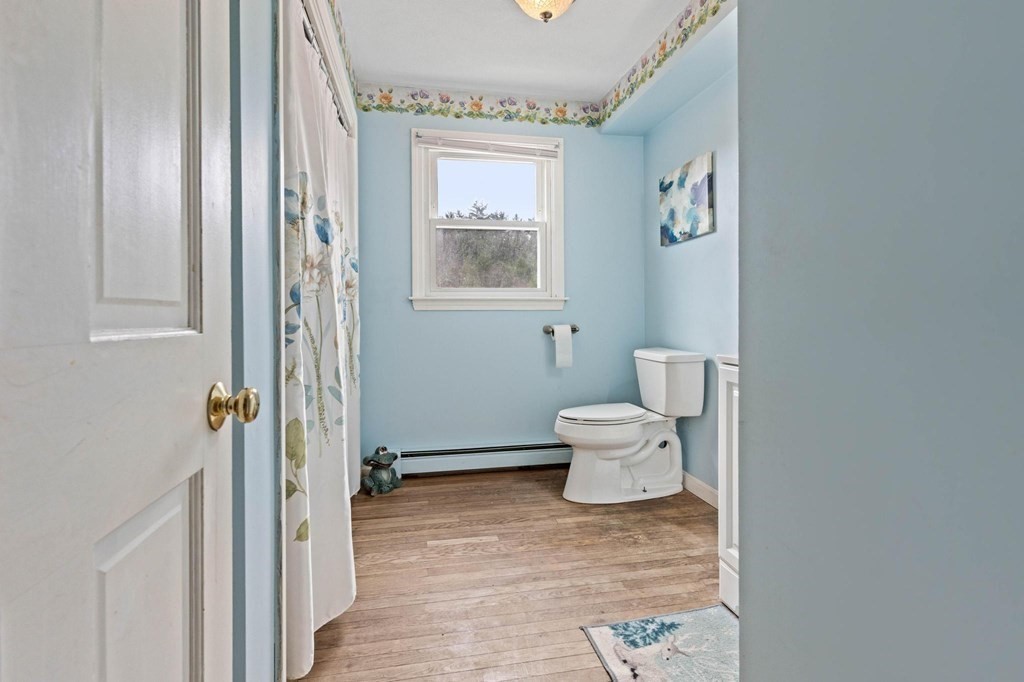 2 Little Farm Road Lakeville, MA 02347 - Photo 11 of 39 a bathroom with a toilet sink and a mirror