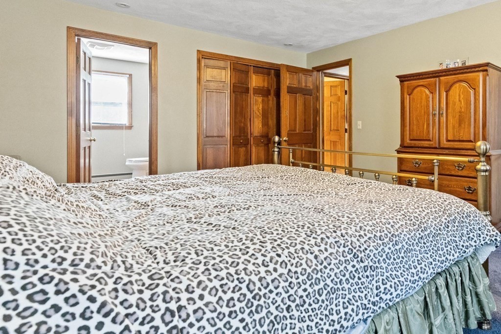 2 Little Farm Road Lakeville, MA 02347 - Photo 16 of 39 a bedroom with a bed and wooden floor