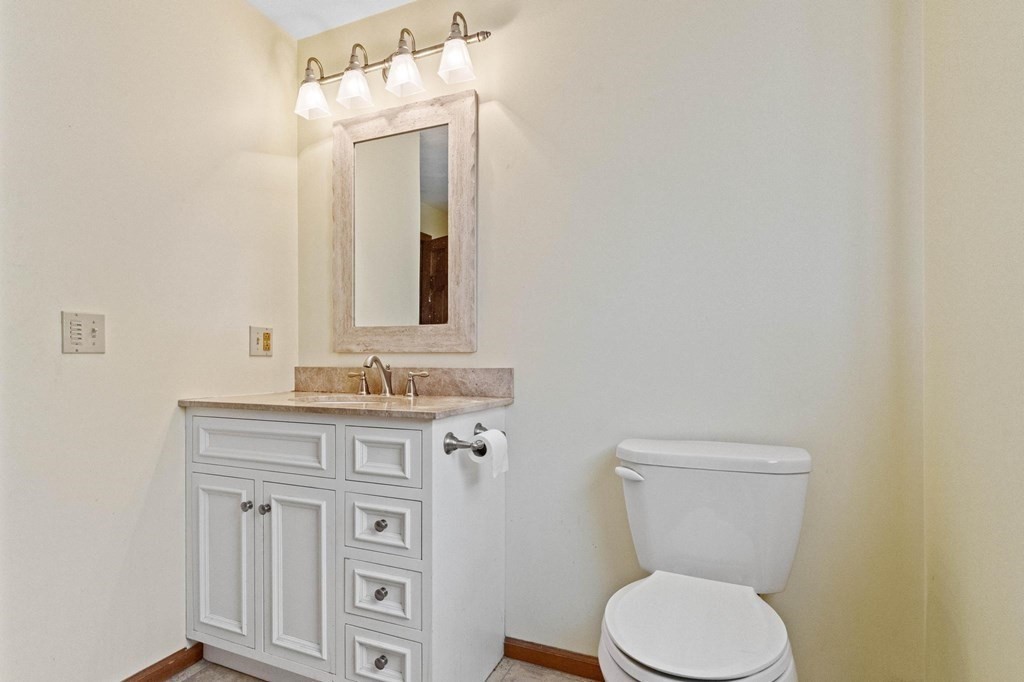2 Little Farm Road Lakeville, MA 02347 - Photo 24 of 39 a bathroom with a toilet a sink and mirror