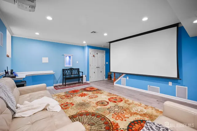 a bedroom with a large bed and a couch