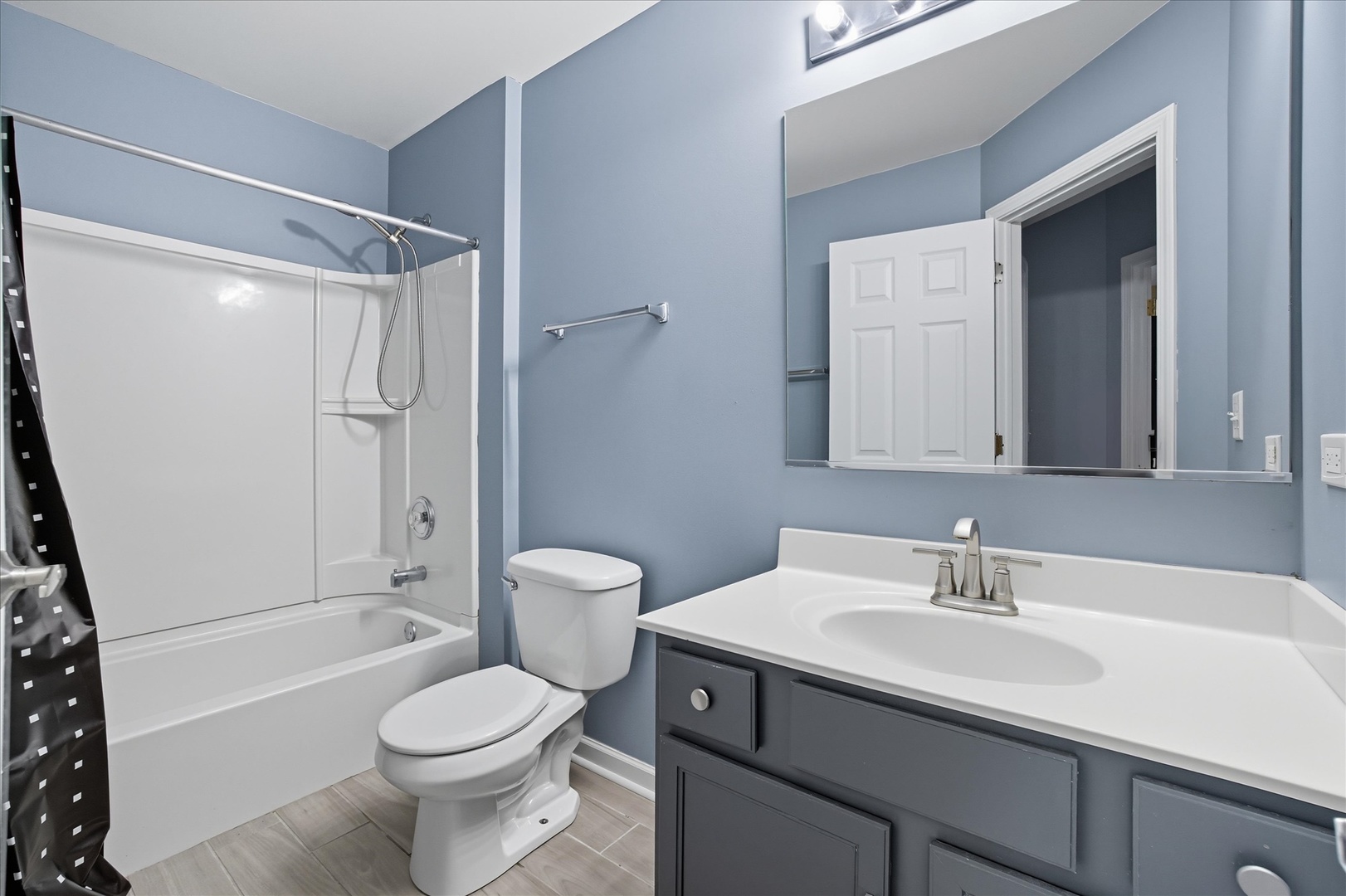 819 Daniel Drive Minooka, IL 60447 - Photo 13 of 33 a bathroom with a sink toilet and shower