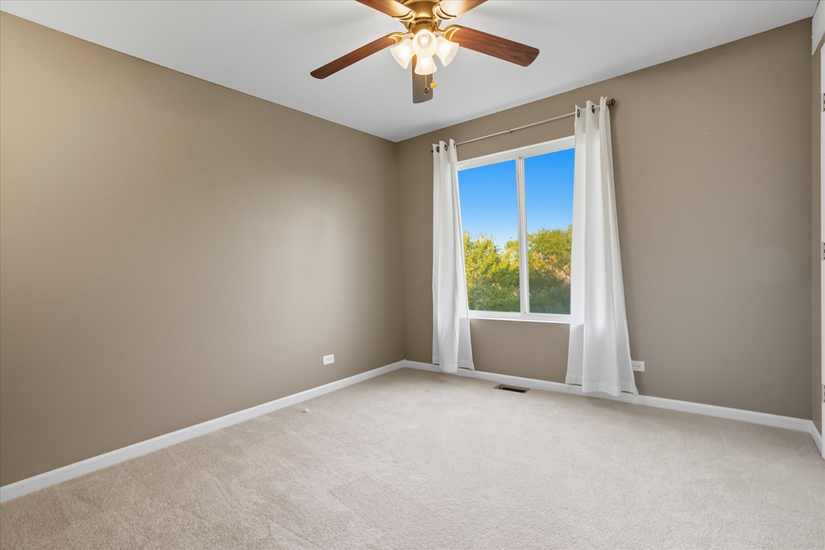 819 Daniel Drive Minooka, IL 60447 - Photo 17 of 33 a view of an empty room with window