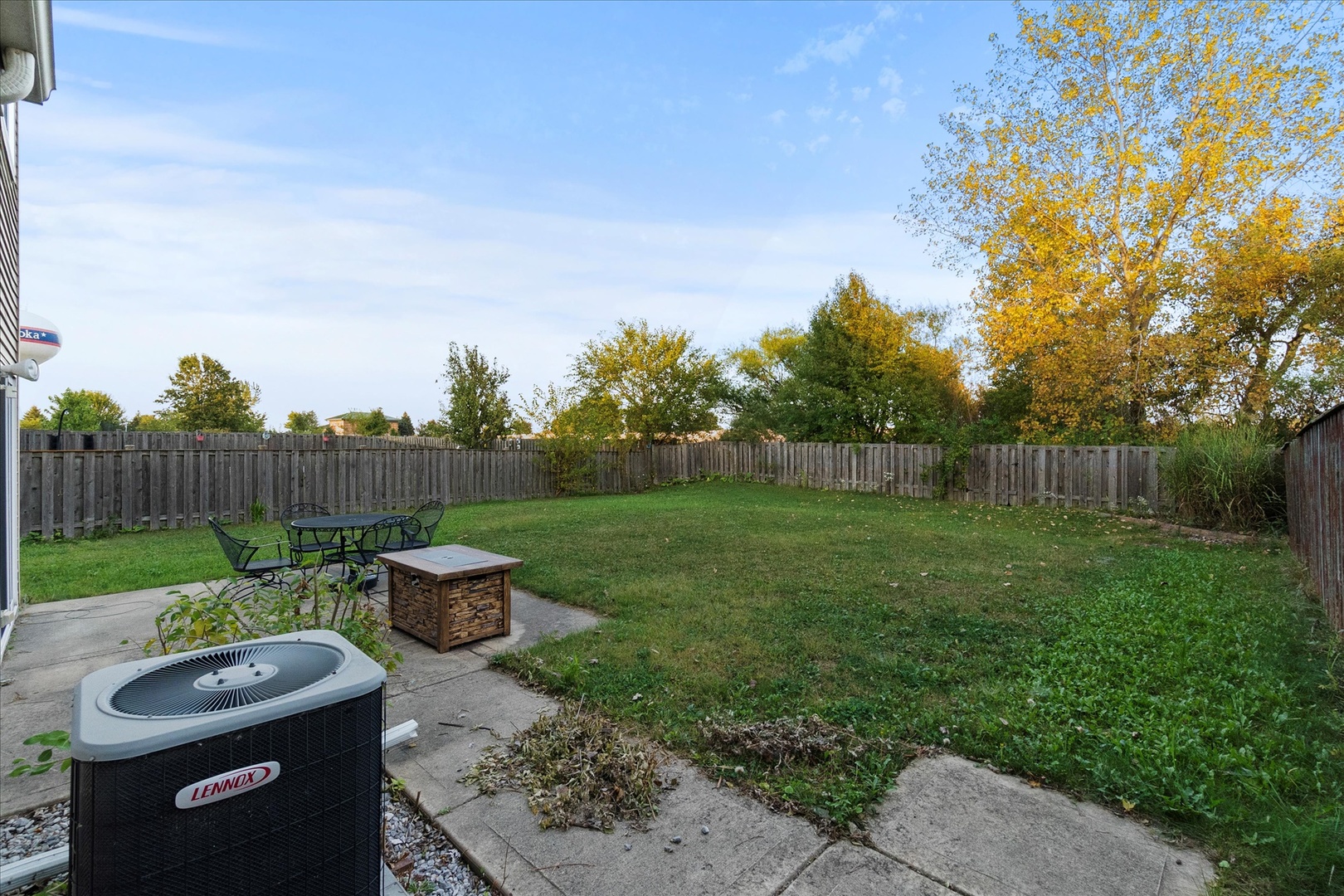 819 Daniel Drive Minooka, IL 60447 - Photo 23 of 33 a view of a backyard with plants and a garden