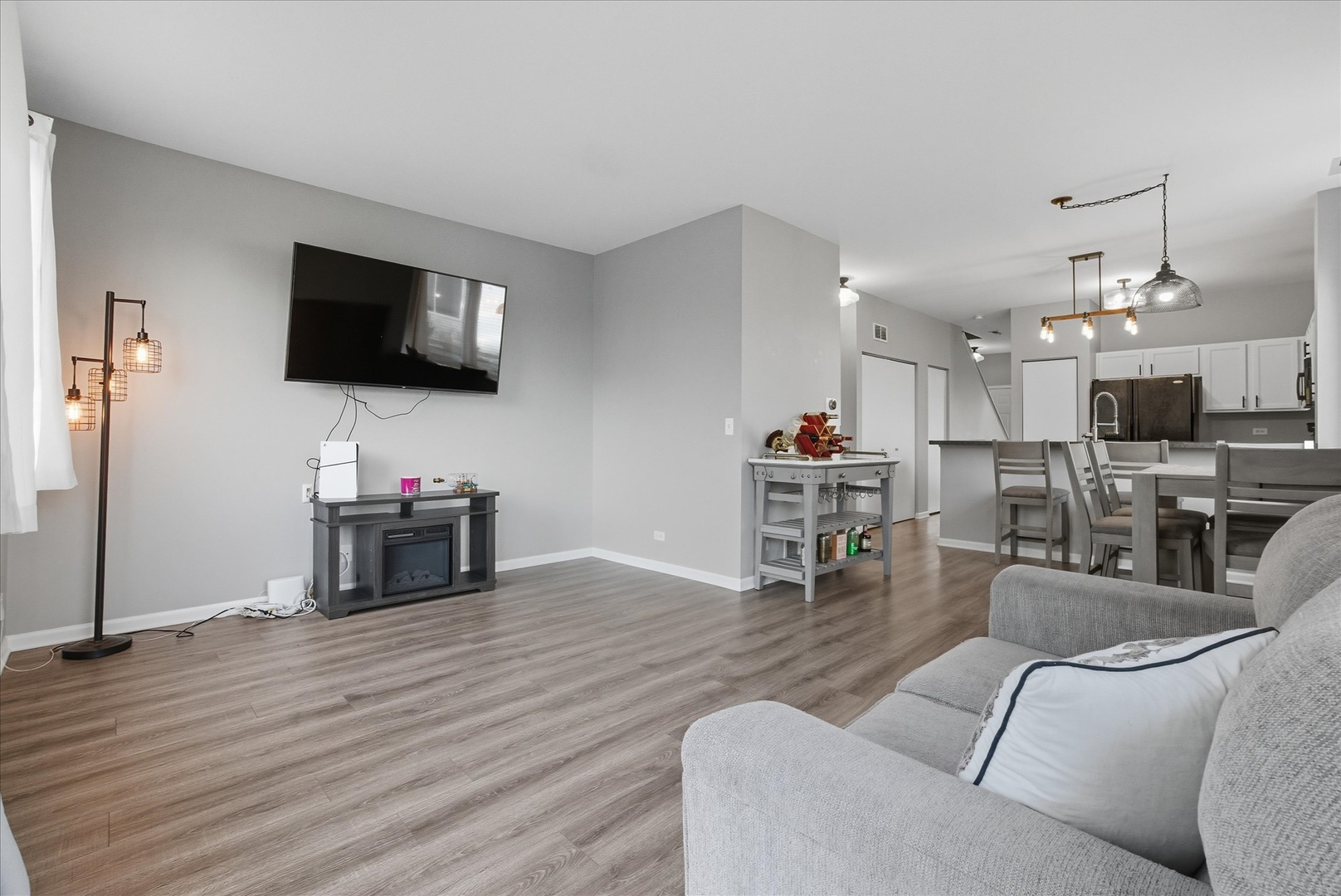 819 Daniel Drive Minooka, IL 60447 - Photo 7 of 33 a living room with furniture and a flat screen tv