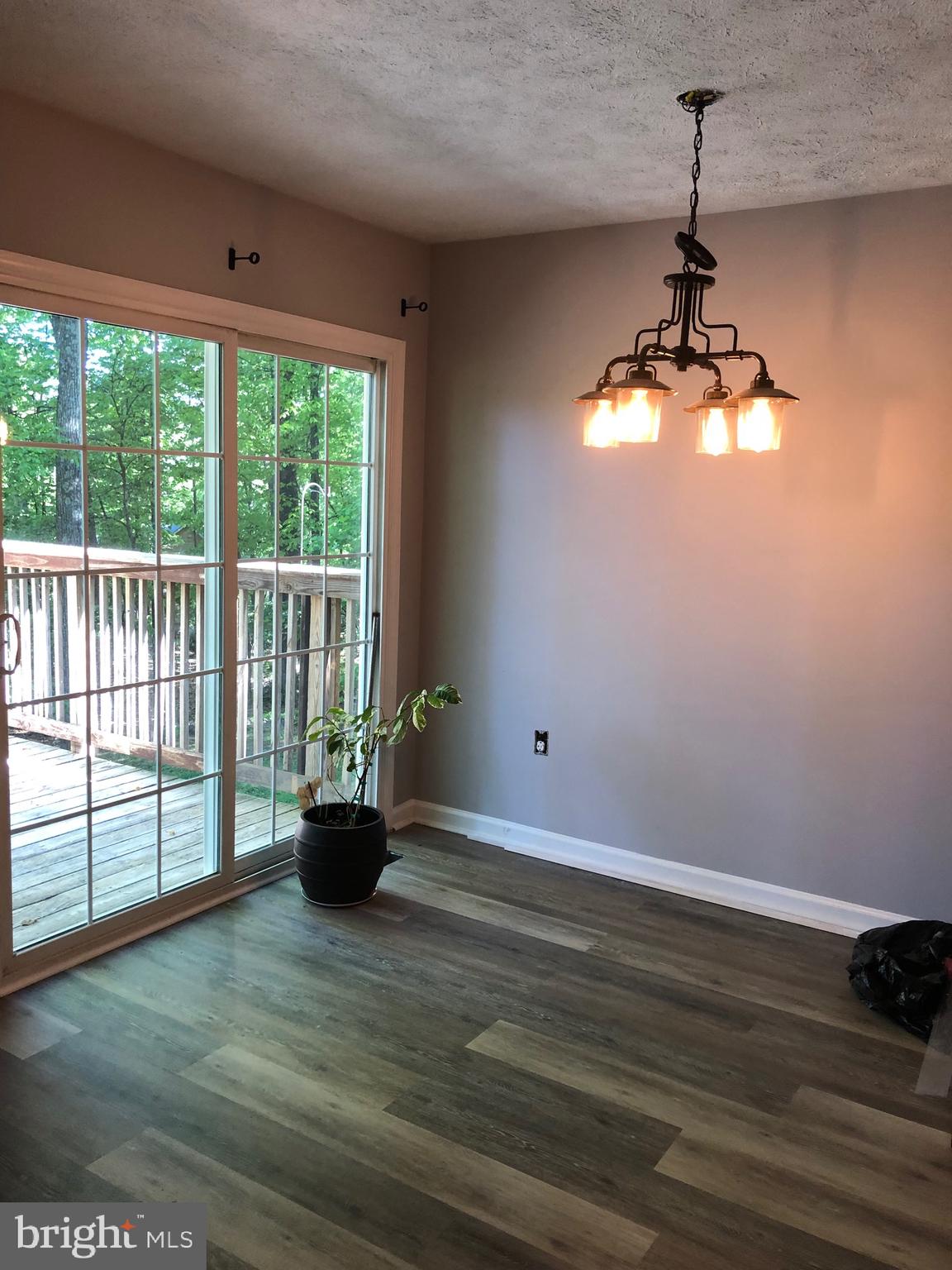 997 Wilderness Road Linden, VA 22642 - Photo 4 of 10 NEW LVP flooring in dining room