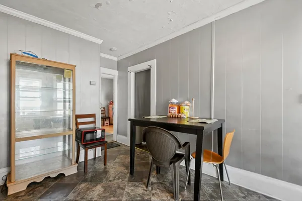 a kitchen with a stove a sink and a refrigerator