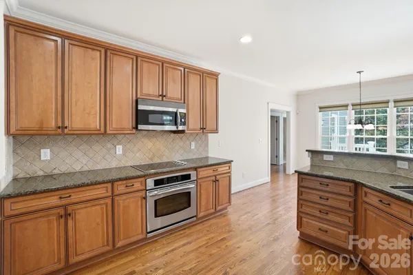 a view of a park with large trees