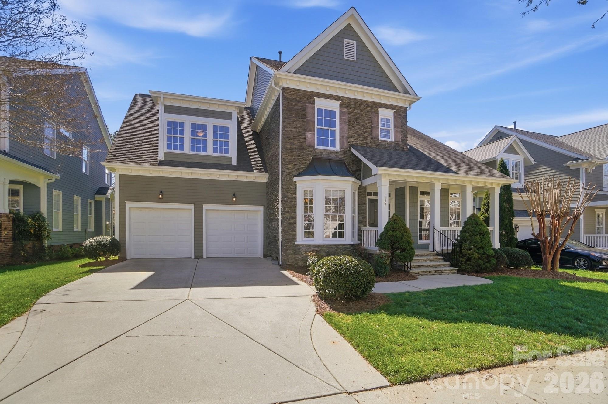 159 Lavender Bloom Loop Mooresville, NC 28115 - Photo 2 of 48 a front view of a house with a yard