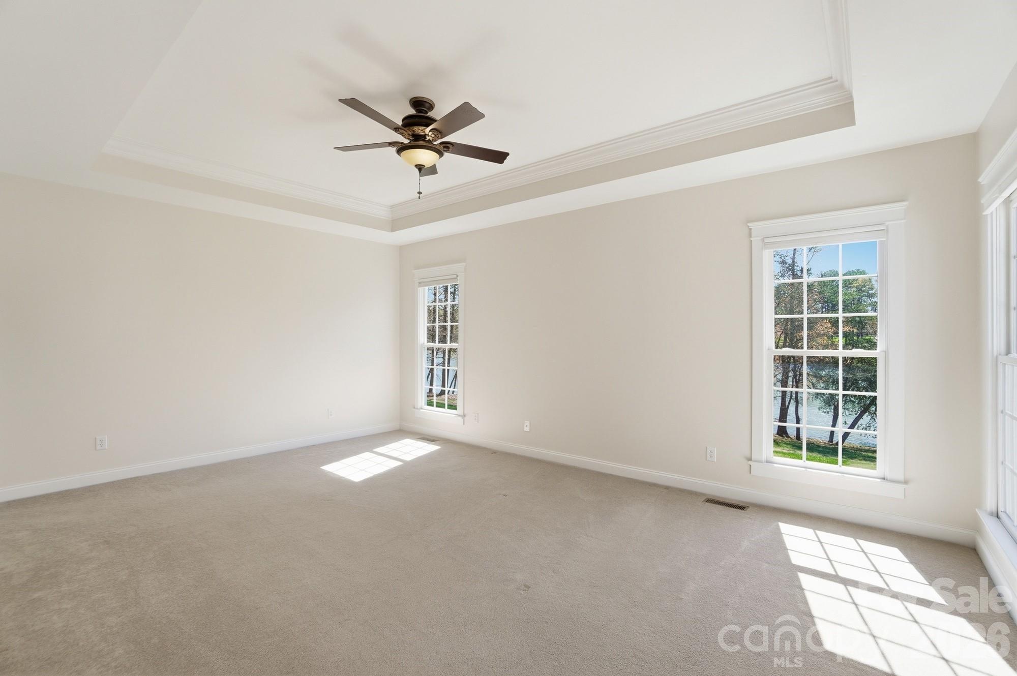 159 Lavender Bloom Loop Mooresville, NC 28115 - Photo 21 of 48 a view of an empty room with a window