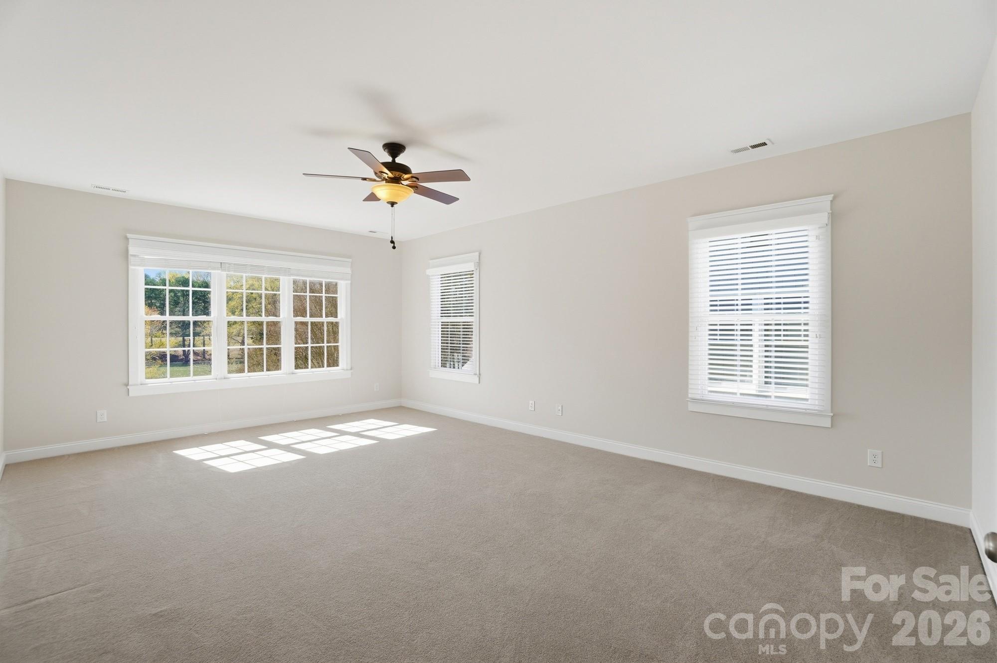 159 Lavender Bloom Loop Mooresville, NC 28115 - Photo 28 of 48 a view of an empty room with a window